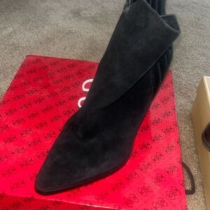 Black suede and leather Guess ankle bootie.  Like brand new.